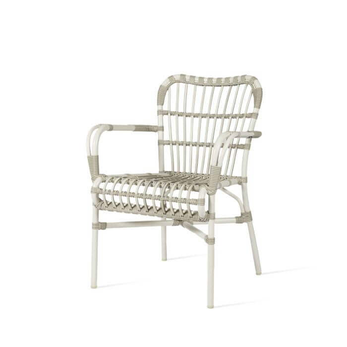 Indulge in the elegance of this stylish white aluminium and weave armchair, adorned with a captivating woven pattern.