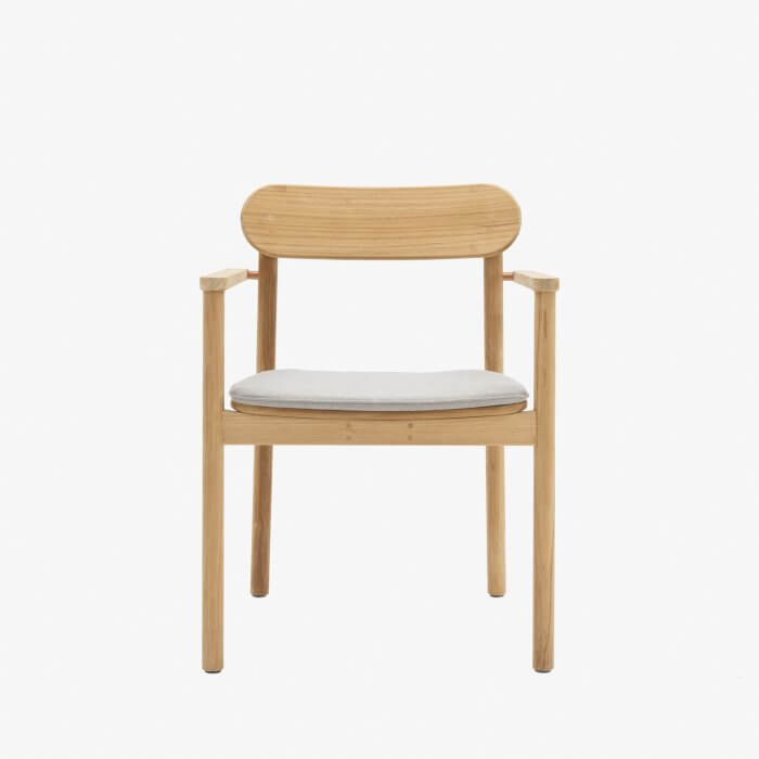 Clean-lined wooden dining armchair exuding modern simplicity and natural warmth, emphasizing its craftsmanship against a white background.